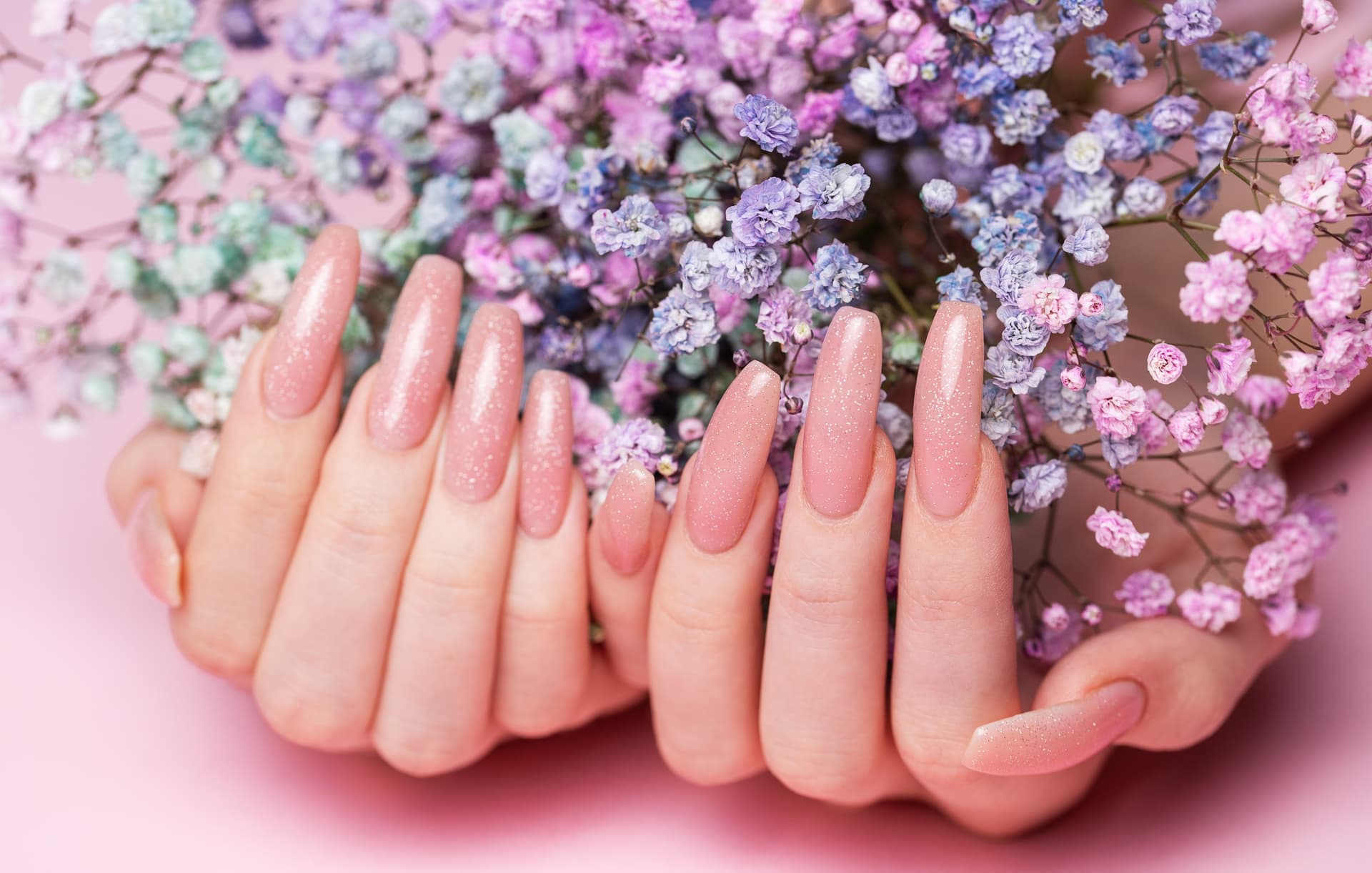 hands holding flowers